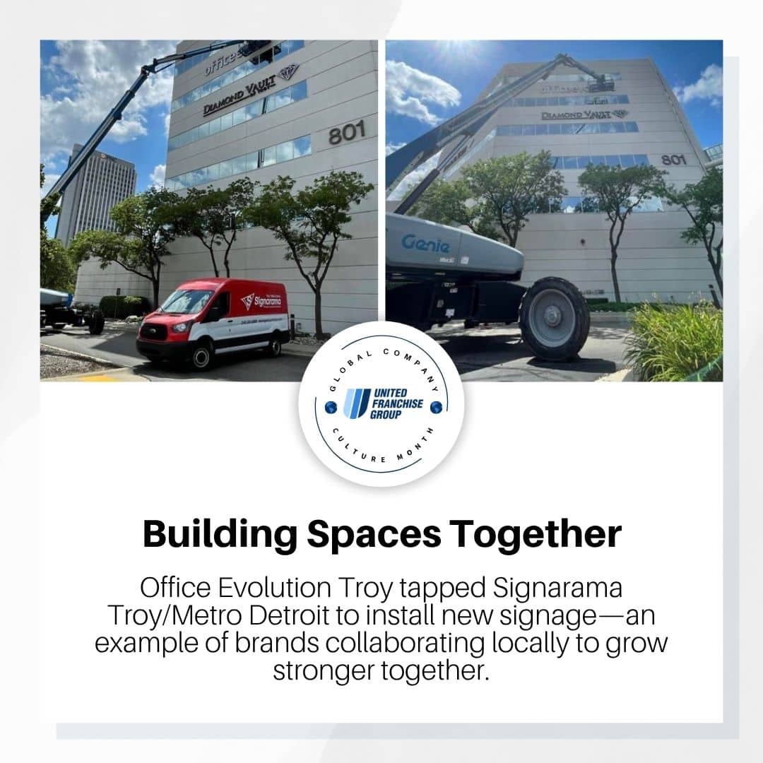 High-rise office building with signage installation by United Franchise Group, showcasing brand collaboration and signage services for commercial properties.